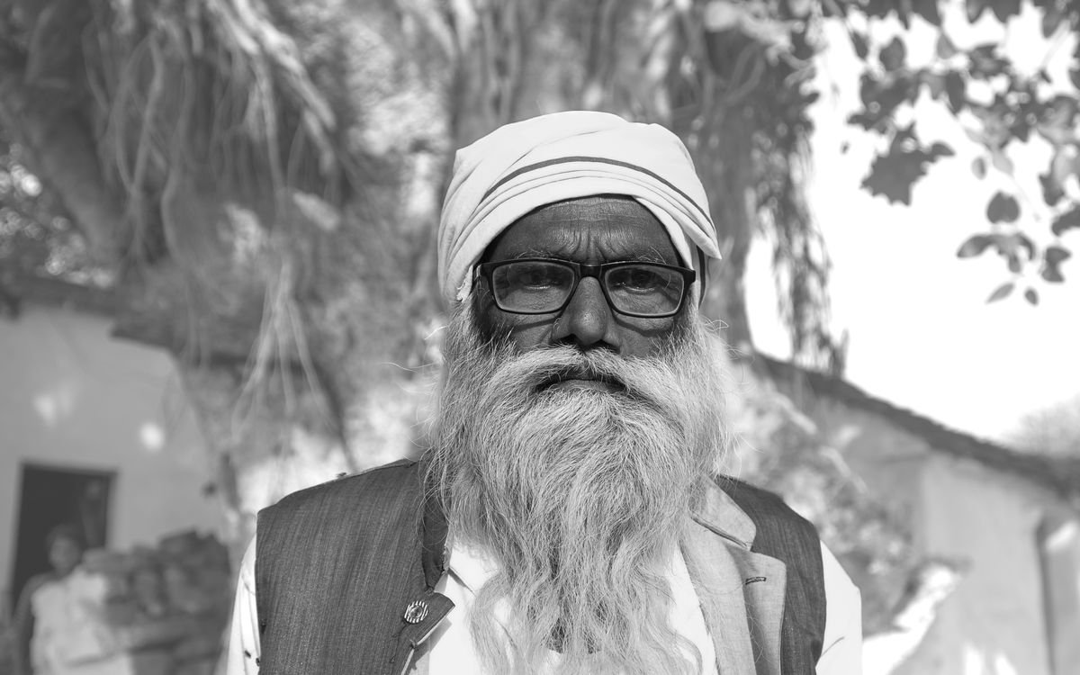 Elderly man in a rural Indian village
